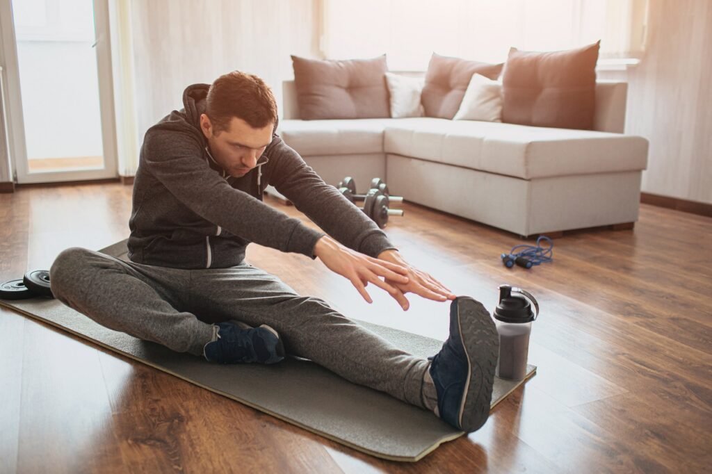 Athlete performing core strength conditioning and leg exercises to build endurance for scuba diving